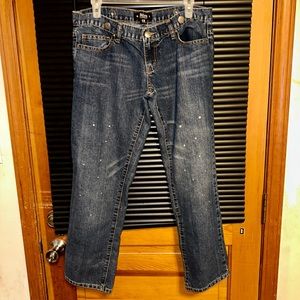 {22} Abbey Dawn low rise boyfriend jeans/capris.           A